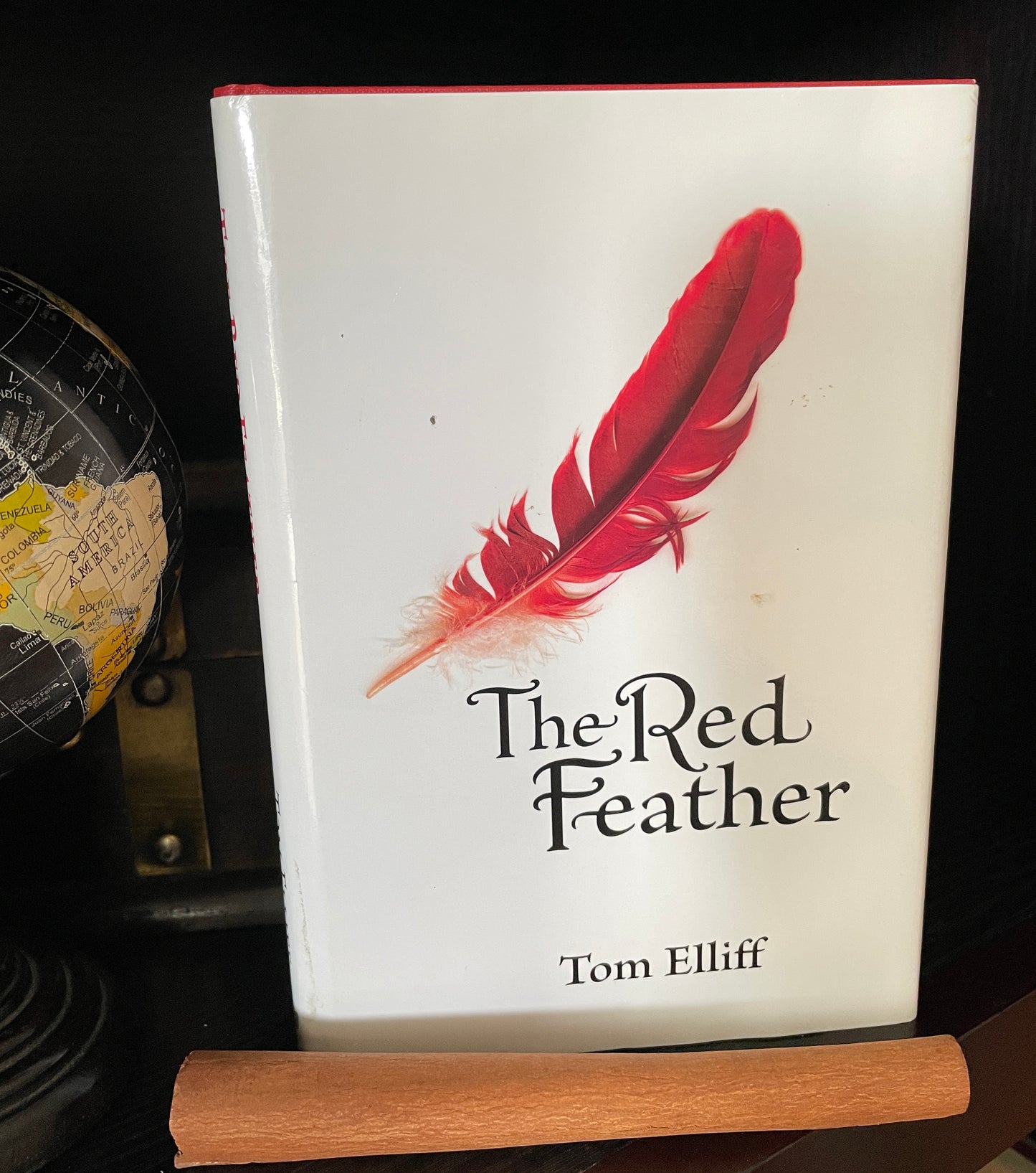 The Red Feather - The Aged Page