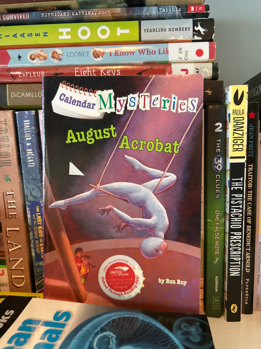 Calendar Mysteries #8: August Acrobat