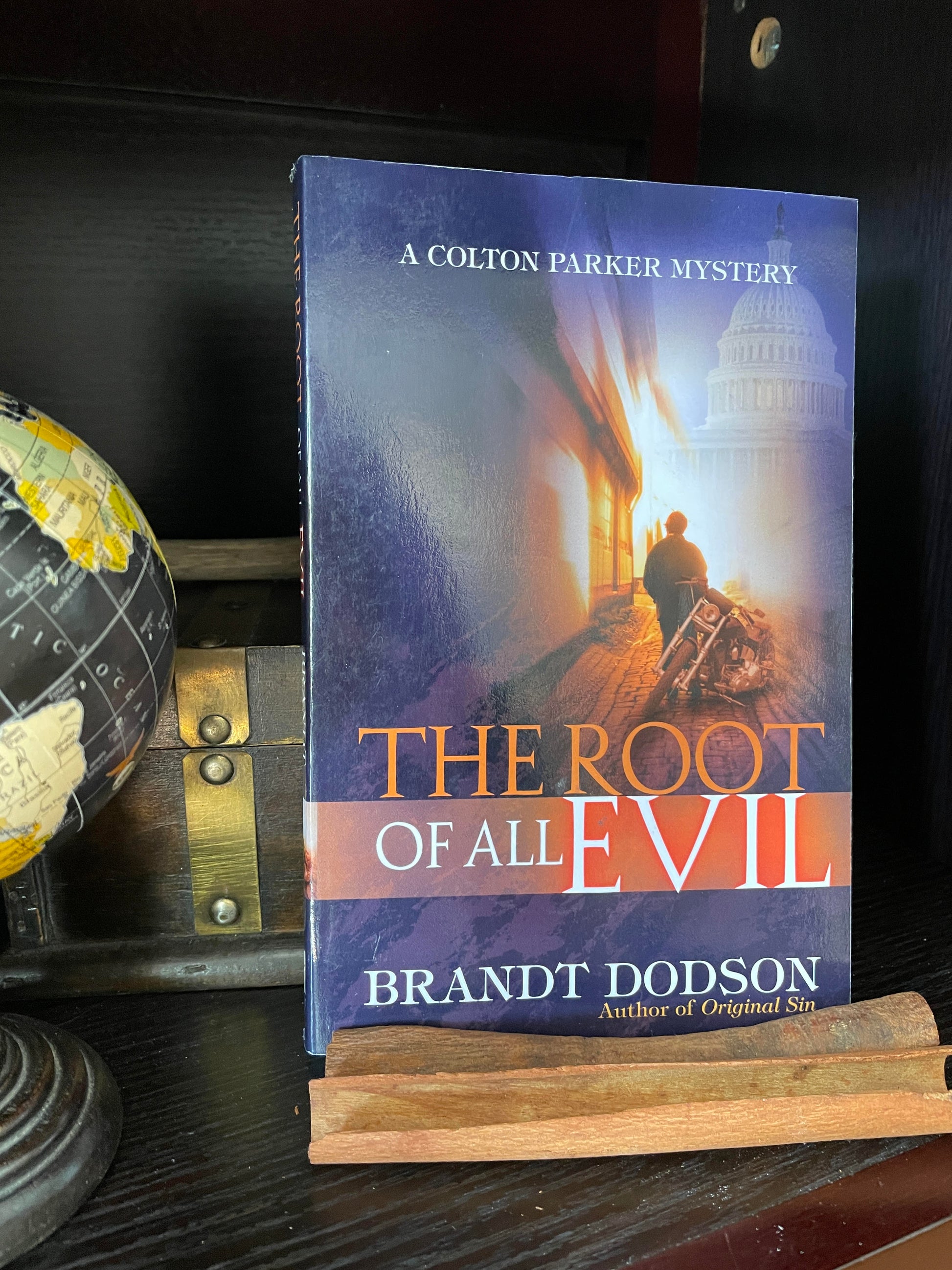The Root of All Evil (Colton Parker Mystery Series, Book 3) - The Aged Page